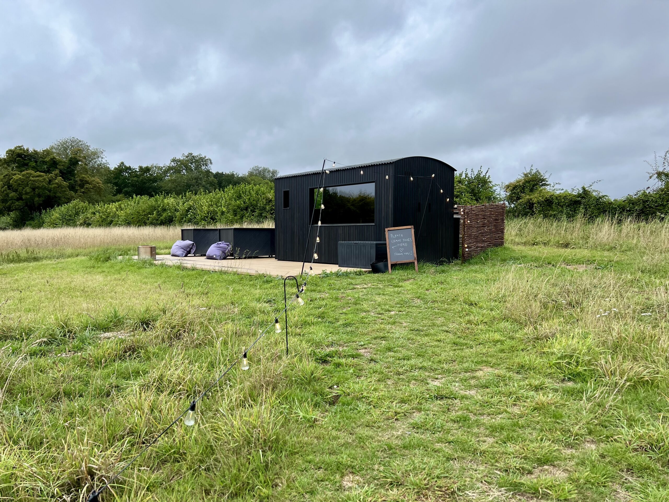 The outdoor Finnish sauna nestled in the English countryside.